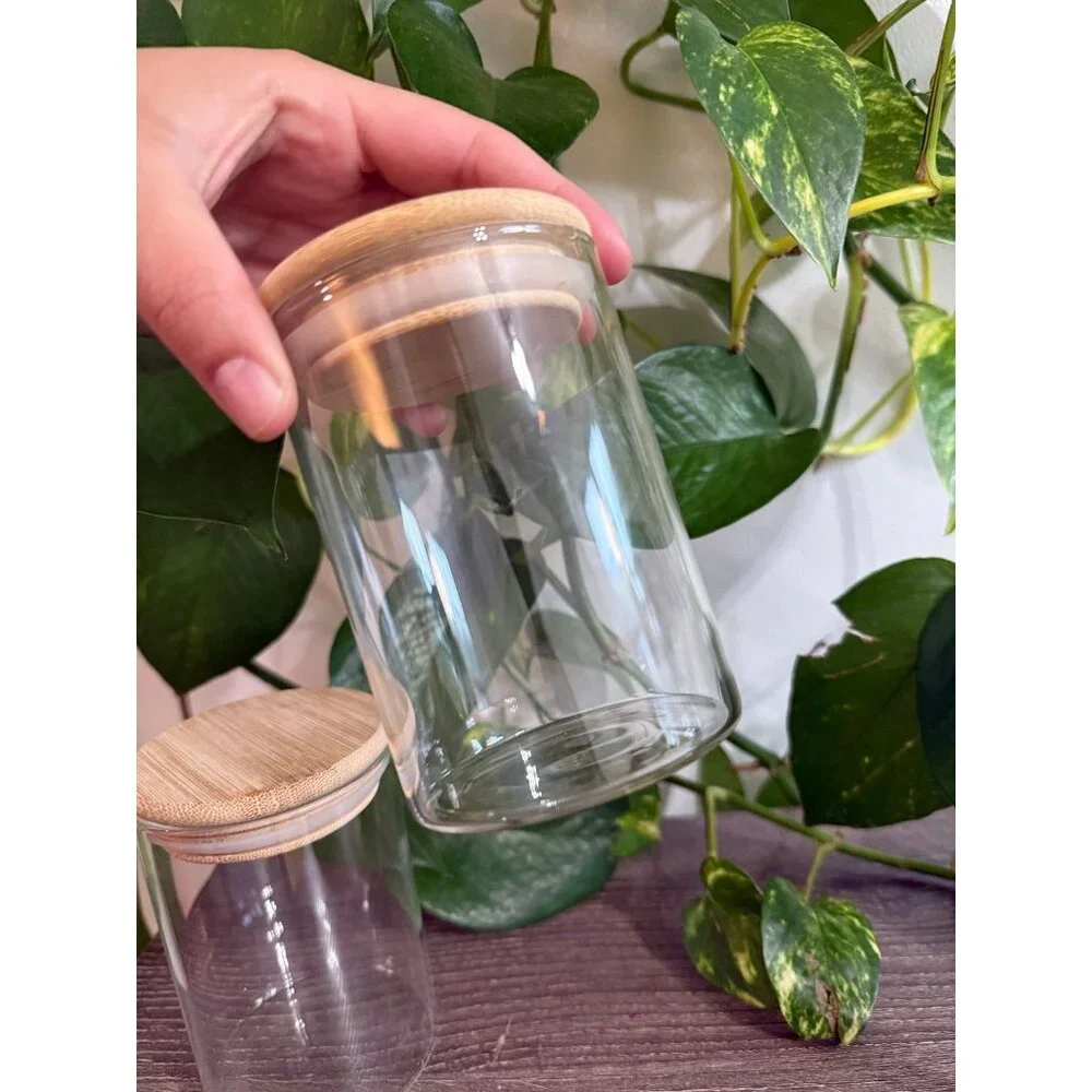Two wooden sealed jars